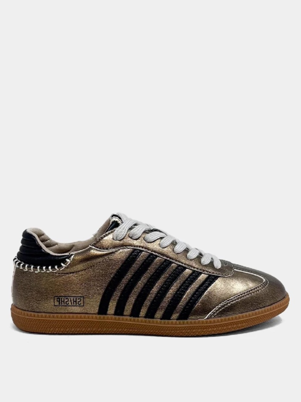 New in box. Stella sneaker ShuShop. Bronze gold w black stripes. Size 8.5